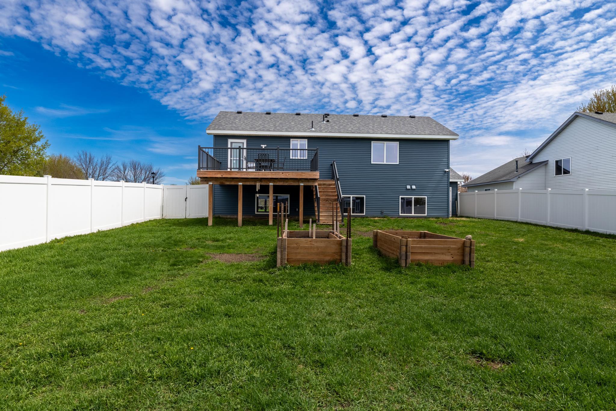 Enjoy a fully fenced-in backyard and deck this summer!