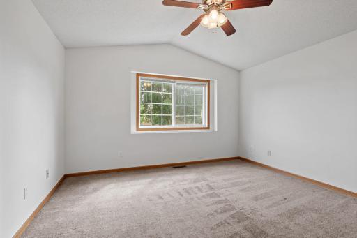 Large primary bedroom with walk in closet and walk through primary bath