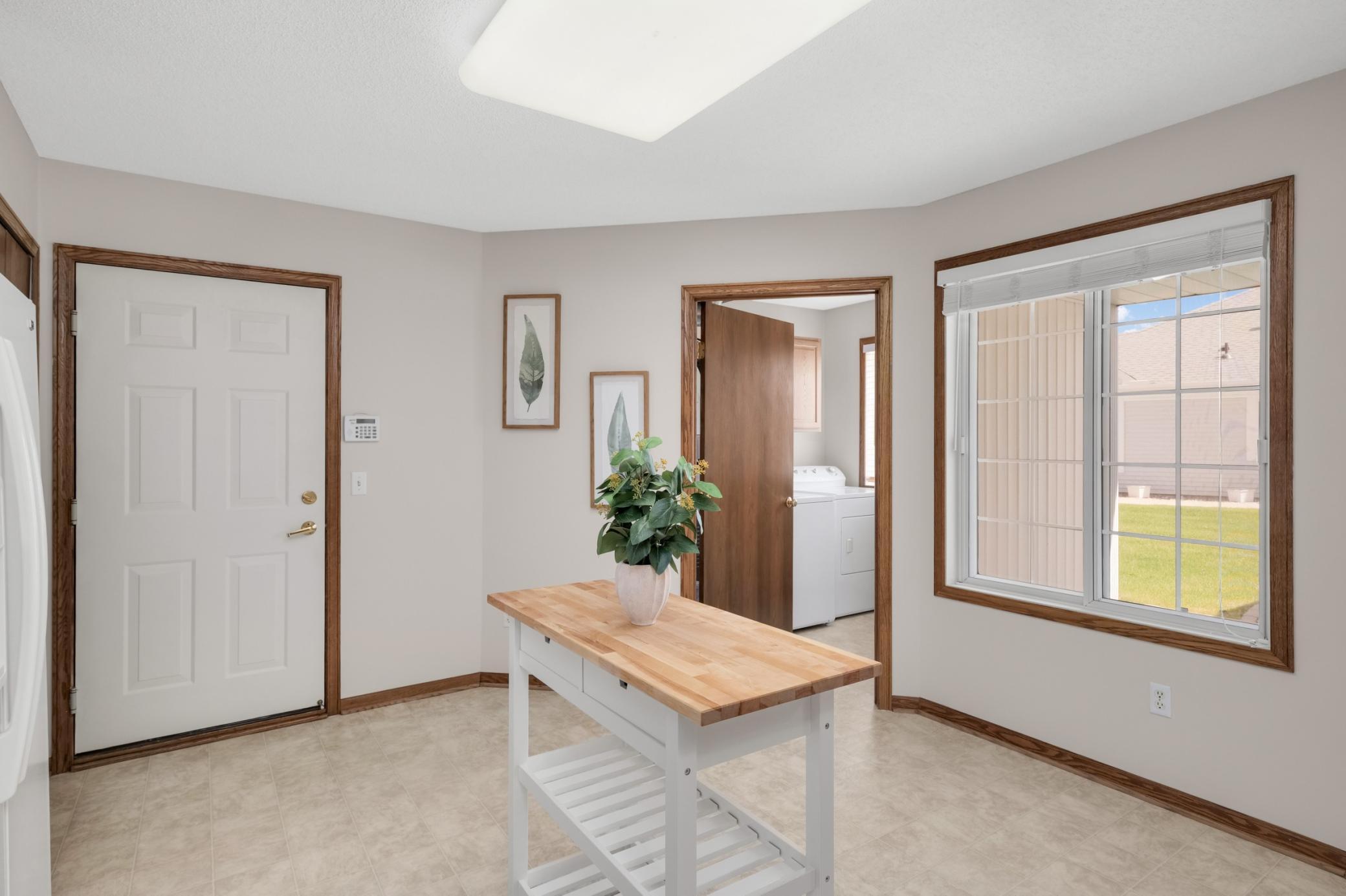 Convenient laundry room off the kitchen