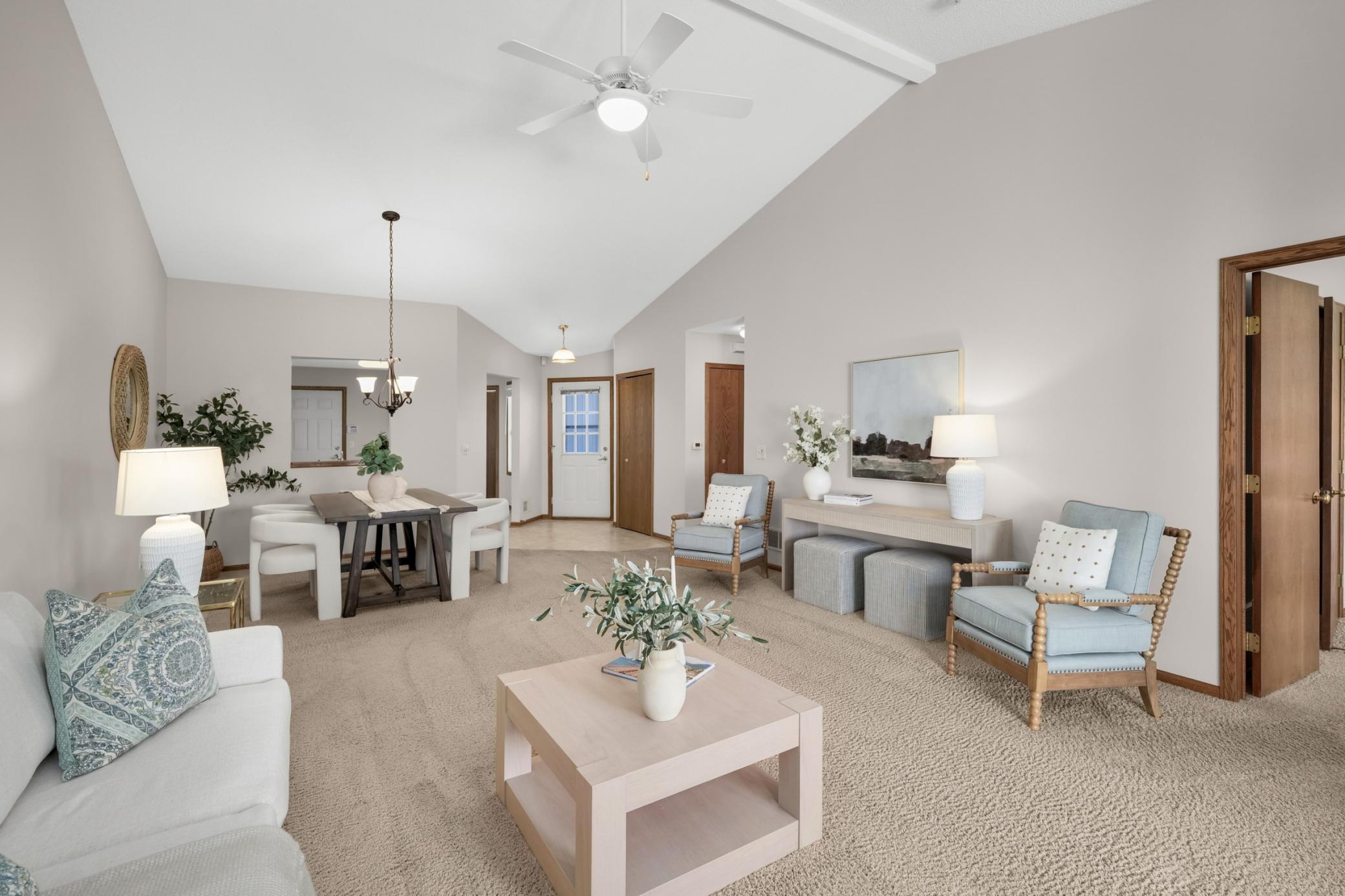 A seamless flow from the dining room to the living room, creating the perfect space for gathering with friends and family