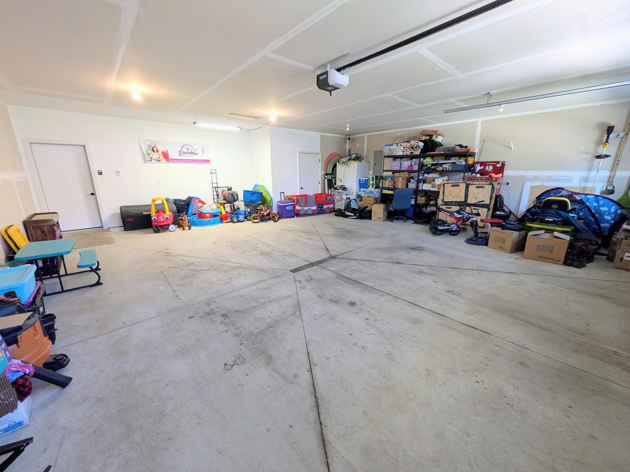 Garage with door to mechanical room