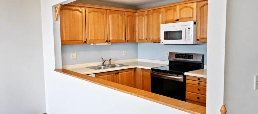 Kitchen Features Generous Cabinet and Storage Options...