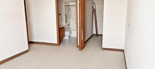 Primary Bedroom Features Walk-In Closet and Full Bath