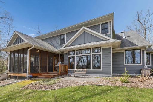The back of the home is impressive. The screen porch is amazing! The perfect spot to enjoy nature and relax!