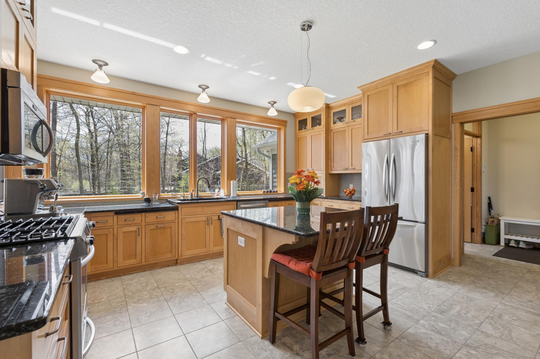 Love, love, love this kitchen! This one is not only magazine worthy, it was exceptionally designed for your everyday needs! Like to host parties? This kitchen would be a dream! Cold feet in the winter? No problem, the kitchen has heated floors!