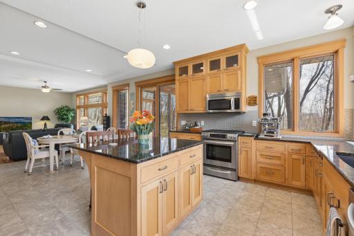 The kitchen is a cook's dream! Impressive custom maple cabinets, gorgeous counter tops and stainless steel appliances make this room extra special!