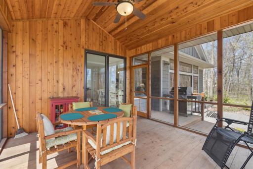 Another view of the spacious screen porch. Lovely details! Perfect!