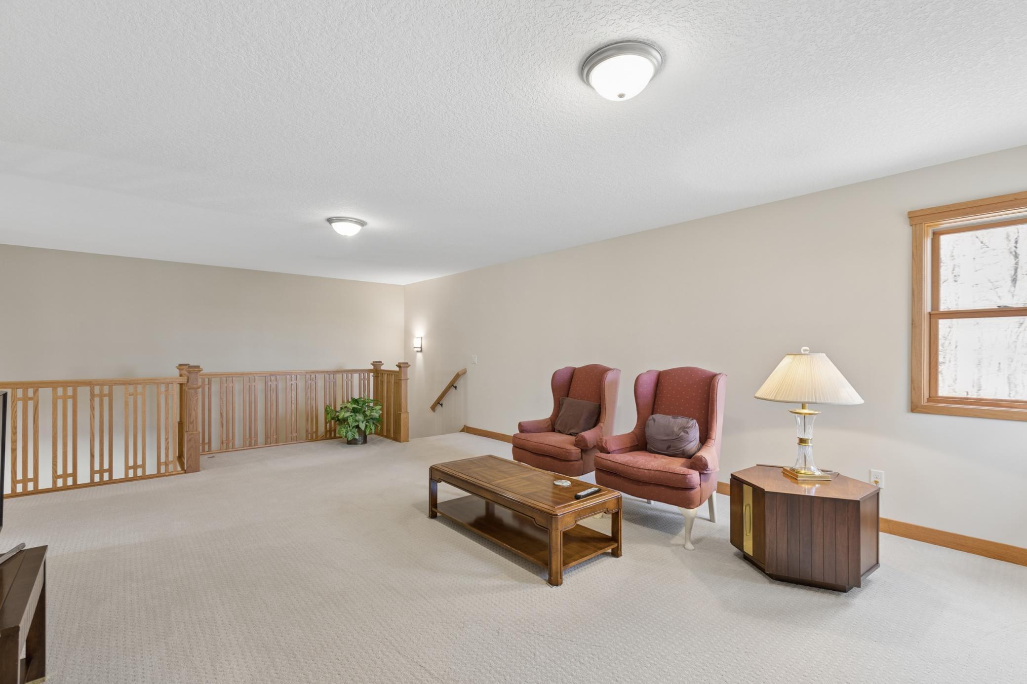The upper level loft is good sized. Bring your decorating ideas! There is so much you could do with this space.