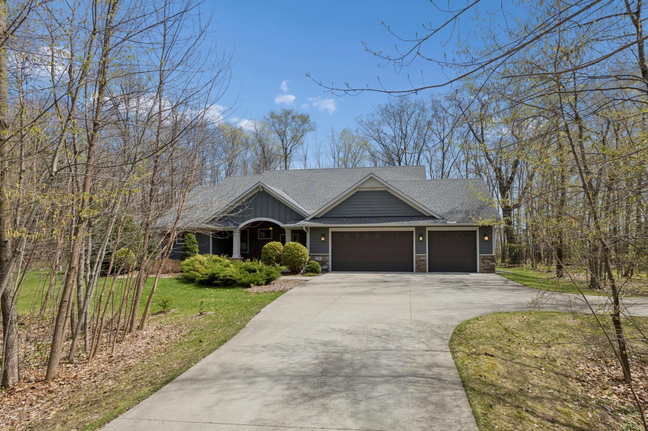 Drive up and fall in love with this fabulous custom built home! Nice concrete driveway!