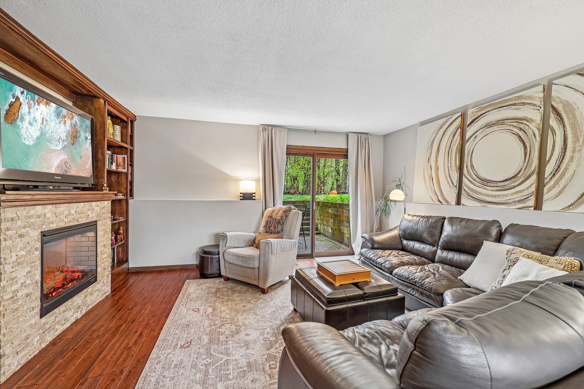 Lower level family room with walkout to a sunken patio