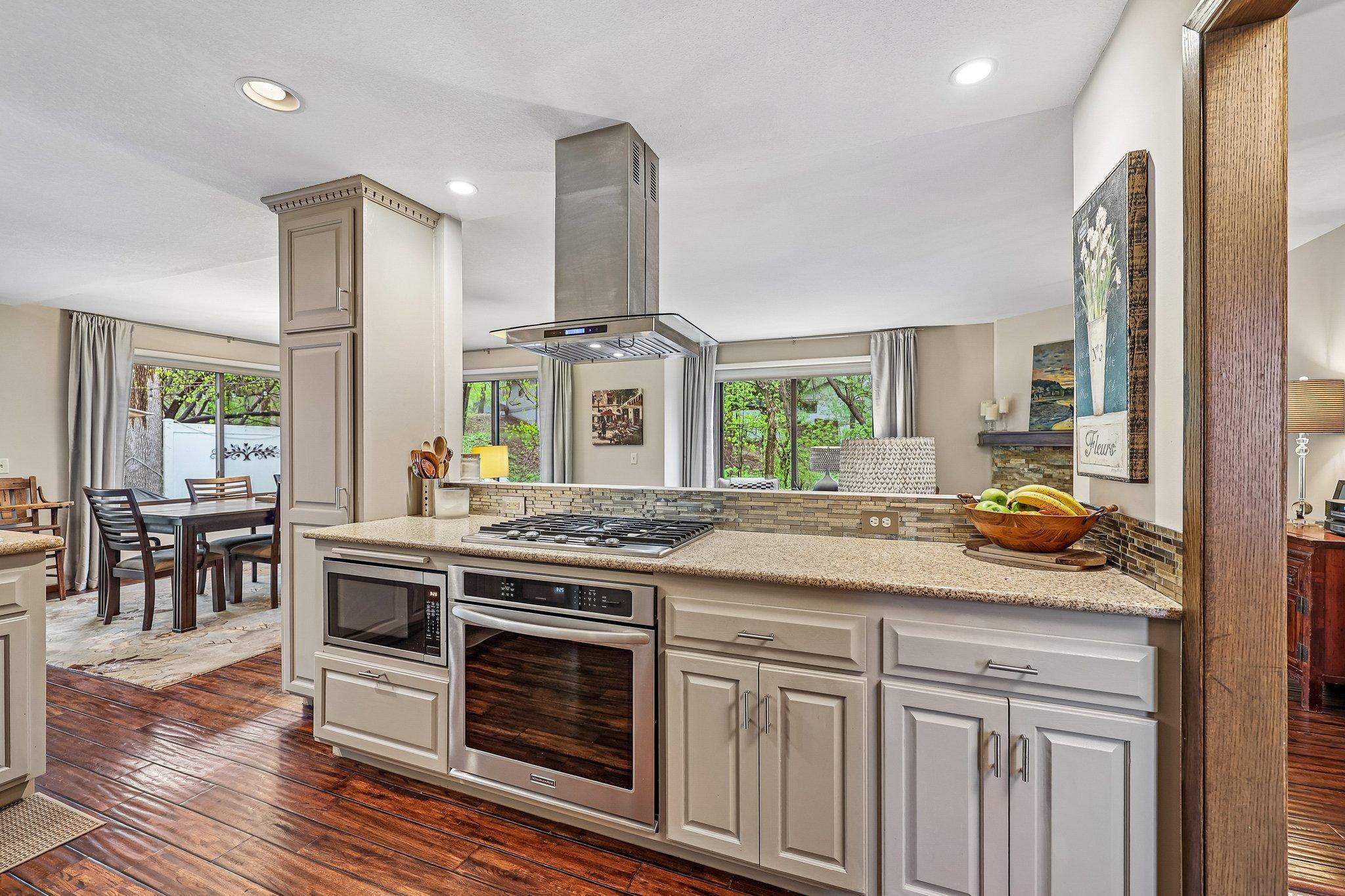 A view of the kitchen that opens to the living room