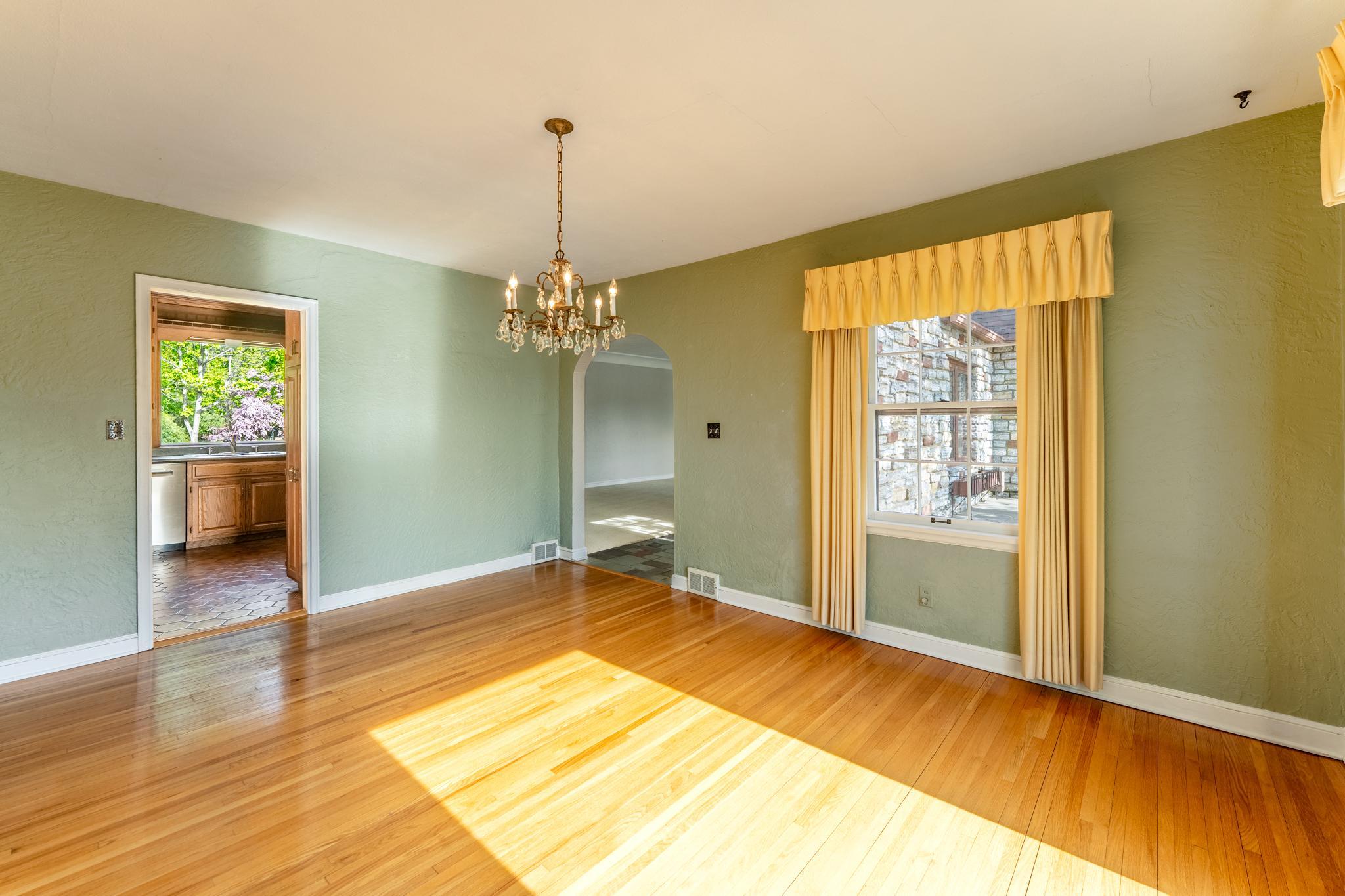 View of the dining room looking toward the kitchen and living room.