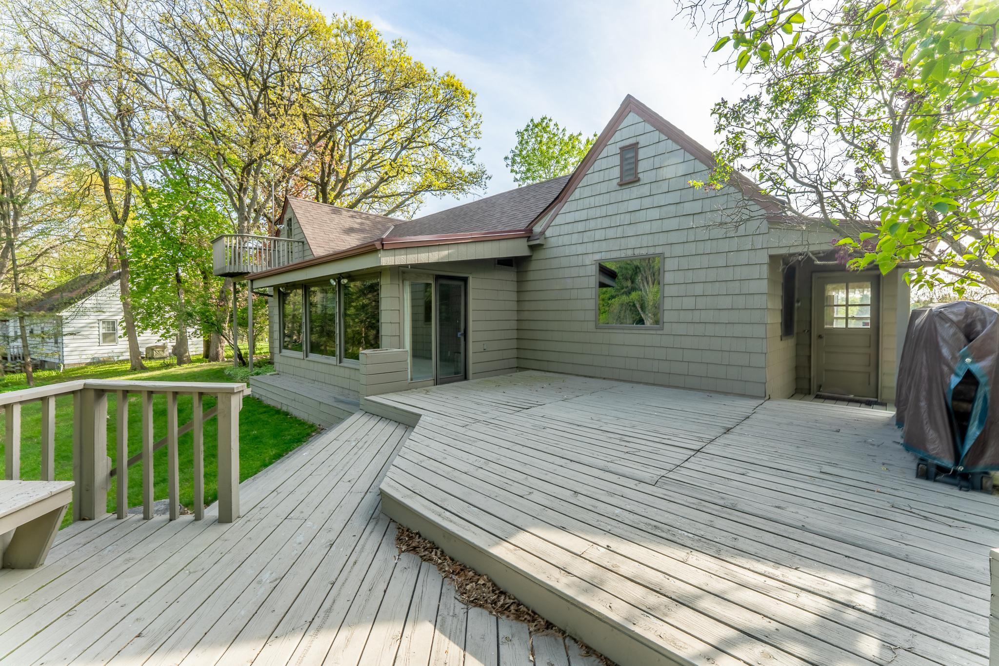 Multi-level deck ready for the summer. Room for outdoor dining table, lounge area and your grill.