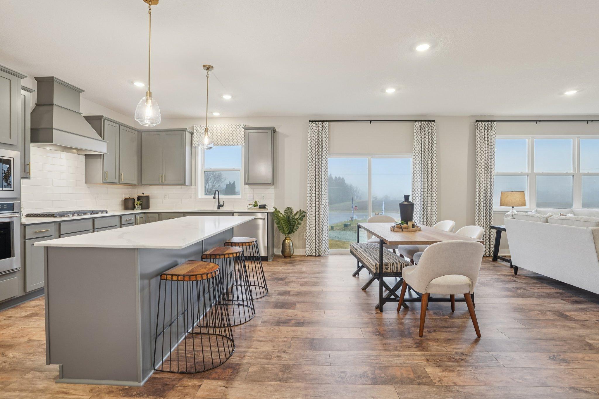 Enjoy the view through the window over your kitchen sink. Photo of model home, finishes will vary.