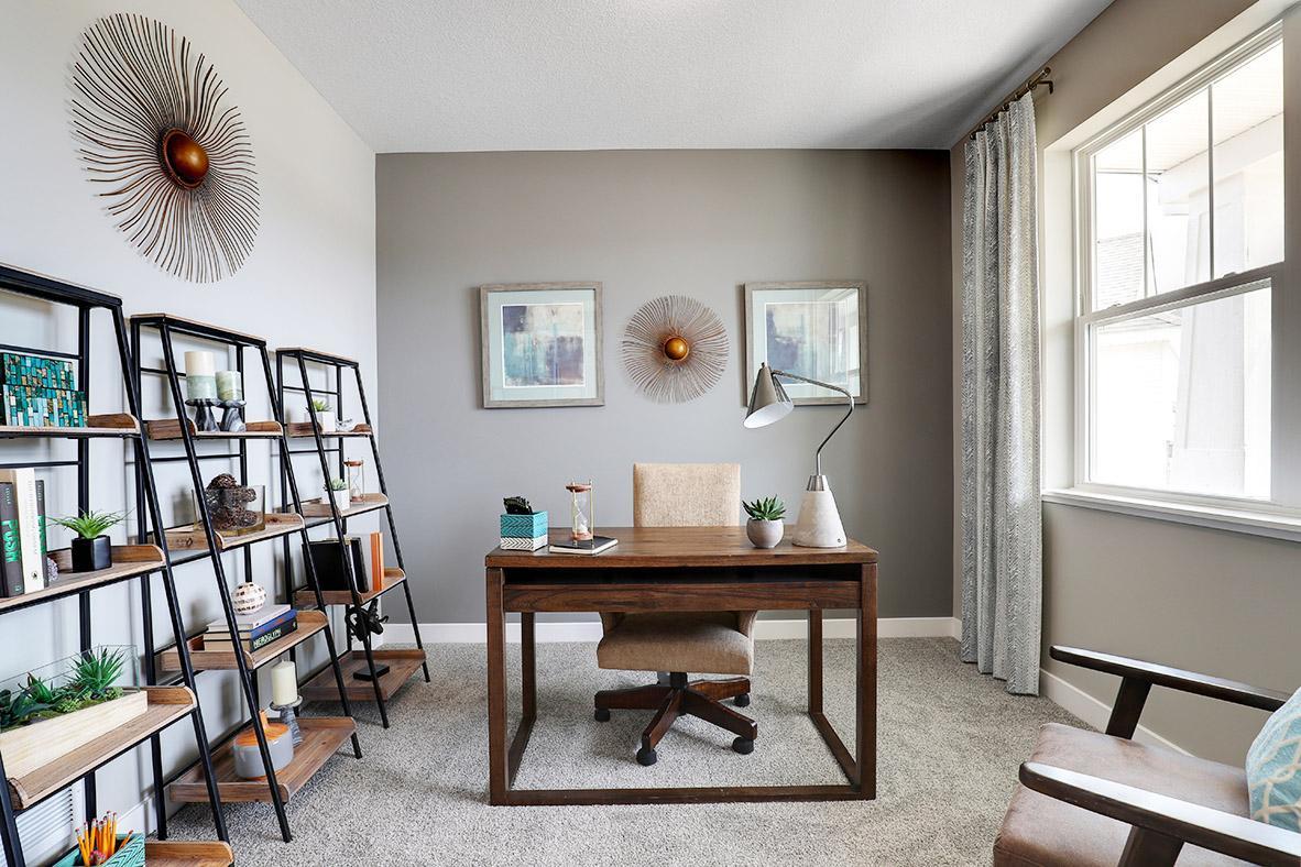 The front flex room can be used as an office space, a playroom for little ones, a formal dining room, a piano room or just another place to relax. Photo of model home, colors and finishes will vary.