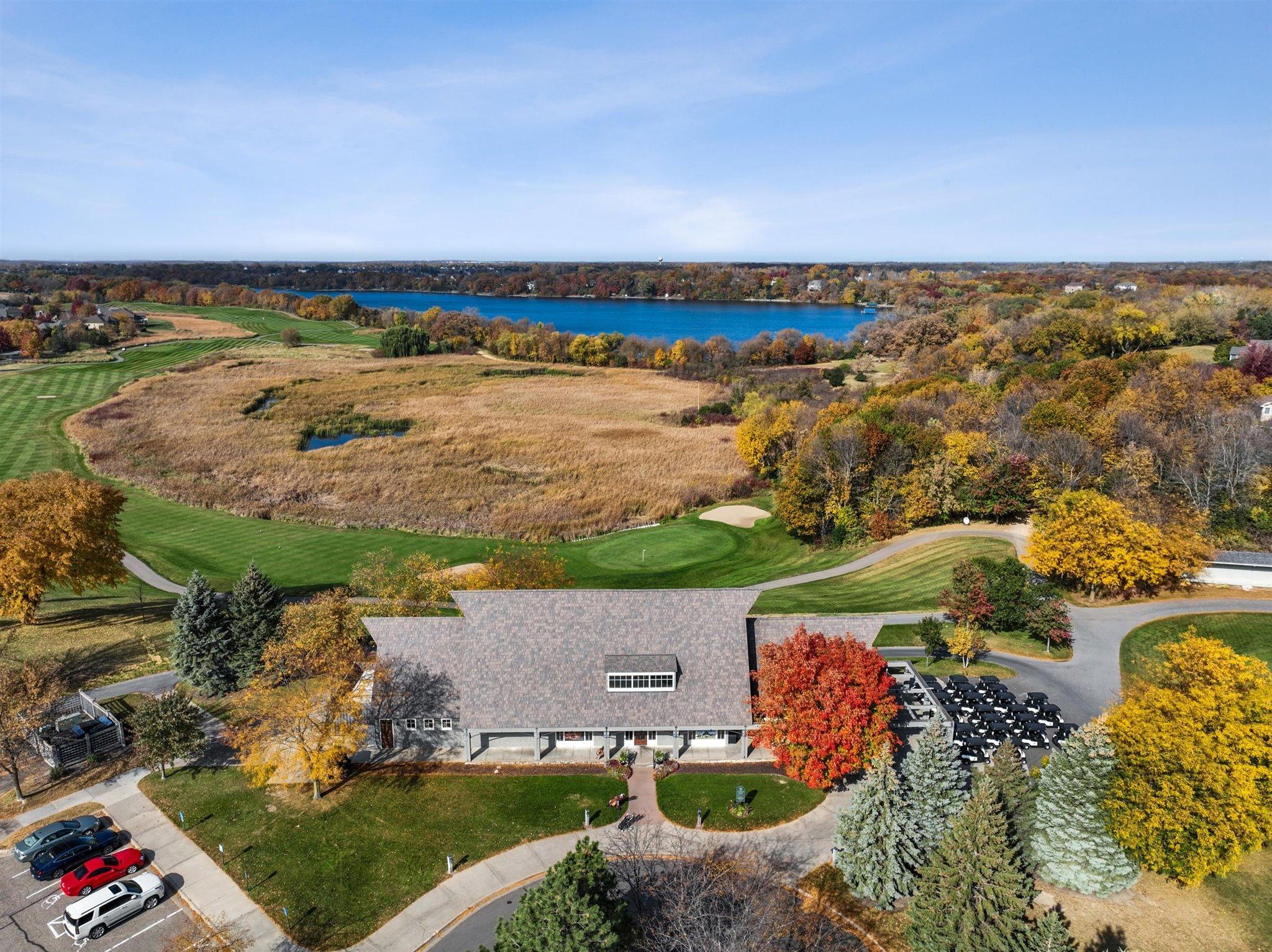 Chaska Town Course clubhouse overlooking the 18th green and Lake Bavaria.