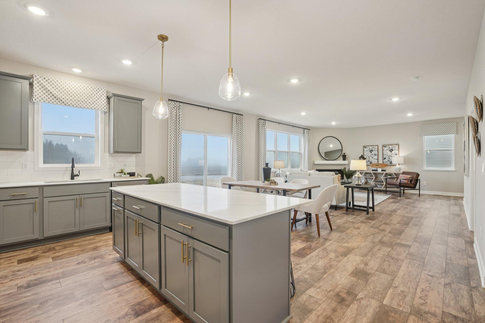 This home has a wonderful open concept main level which is great for entertaining and everyday living. Photo of model home, other finishes will vary.