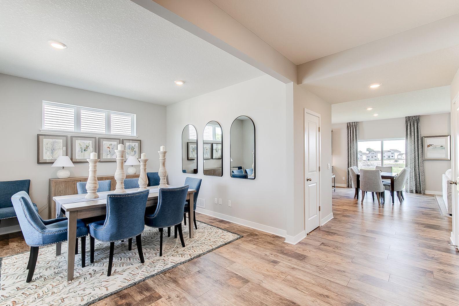 Great windows in your front flex room overlook a field. Photo of model home, colors and finishes are similar.