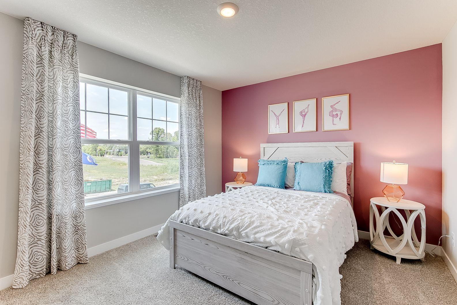 Another gorgeous secondary bedroom. Photo of model, colors and finishes are similar.