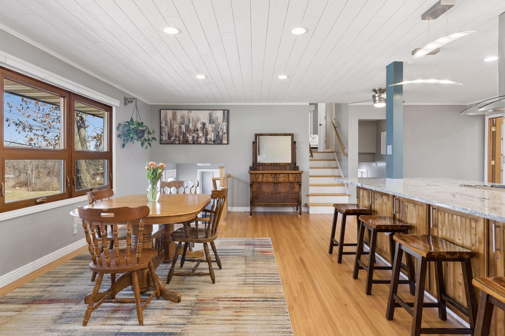 The dining area is light filled and leads into the kitchen.