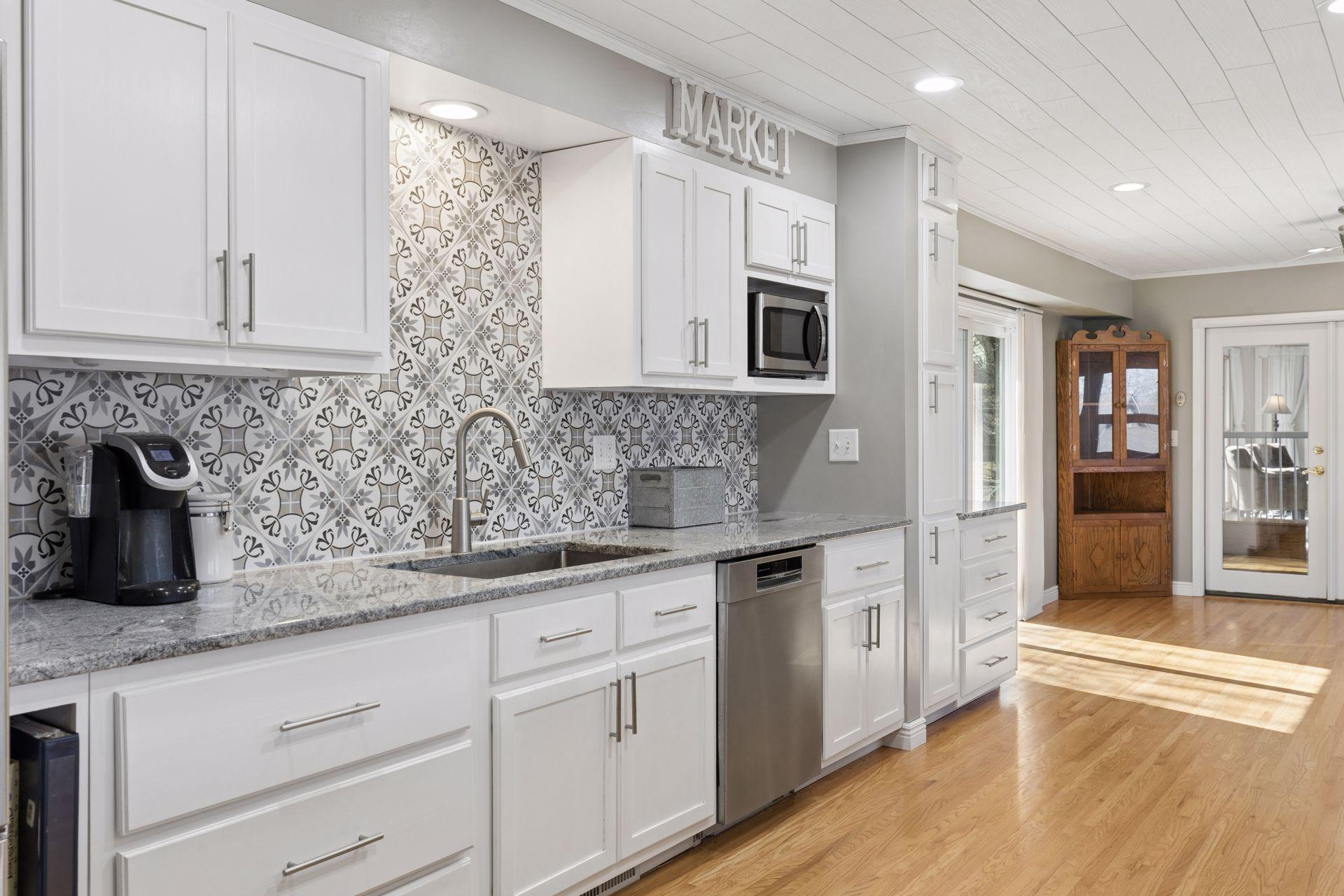 There is so much counter and cabinet space here.