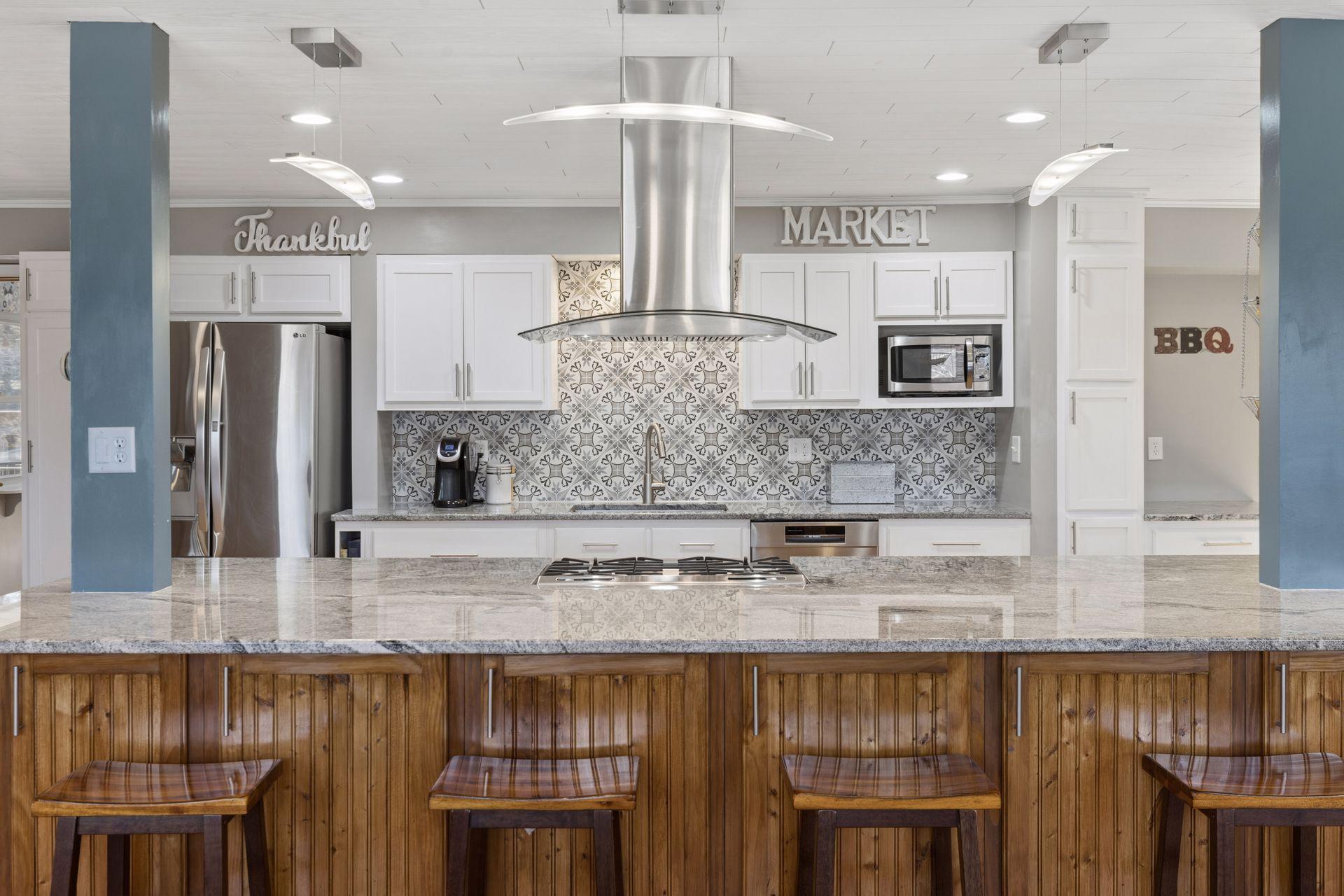 The island is the spot to gather, prep, cook, or do homework.