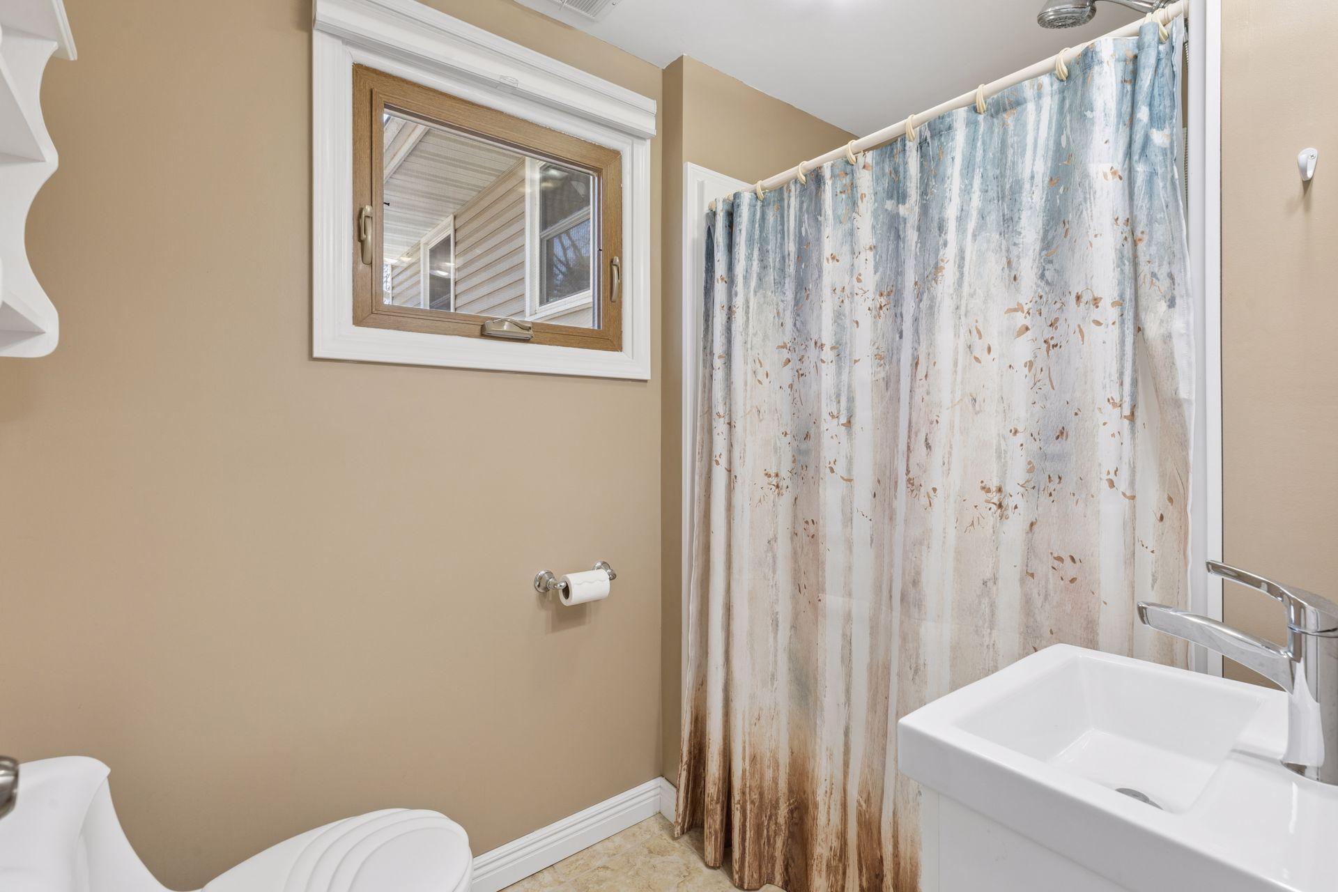 The 3/4 bathroom is located on the same level as bedrooms 4 and 5.