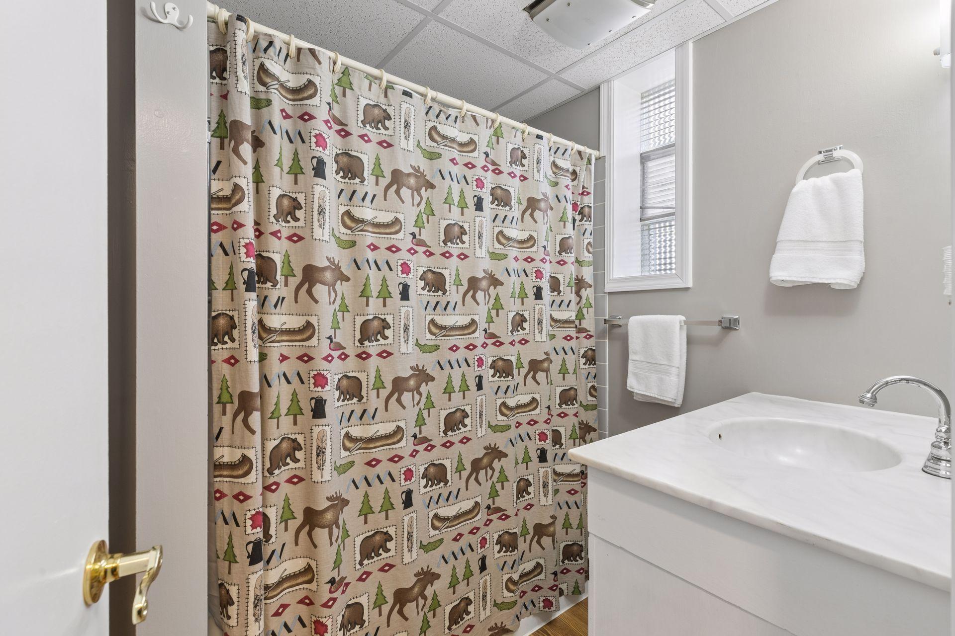 The third bathroom is another full bath and is located in the basement.