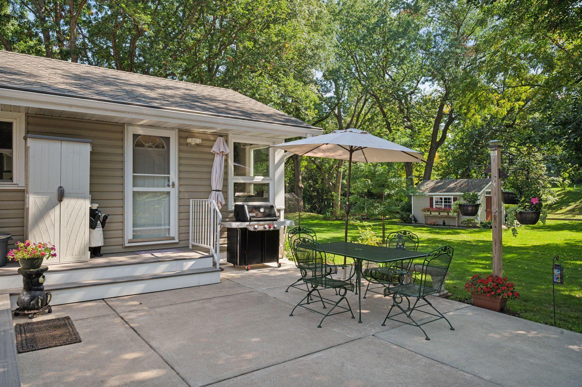 Off the rear of the home is a great spot for grilling and entertaining.