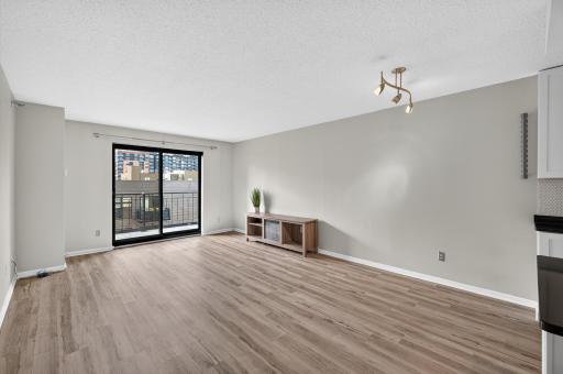 The open concept living / dining room is great for hosting or relaxing after a long day!