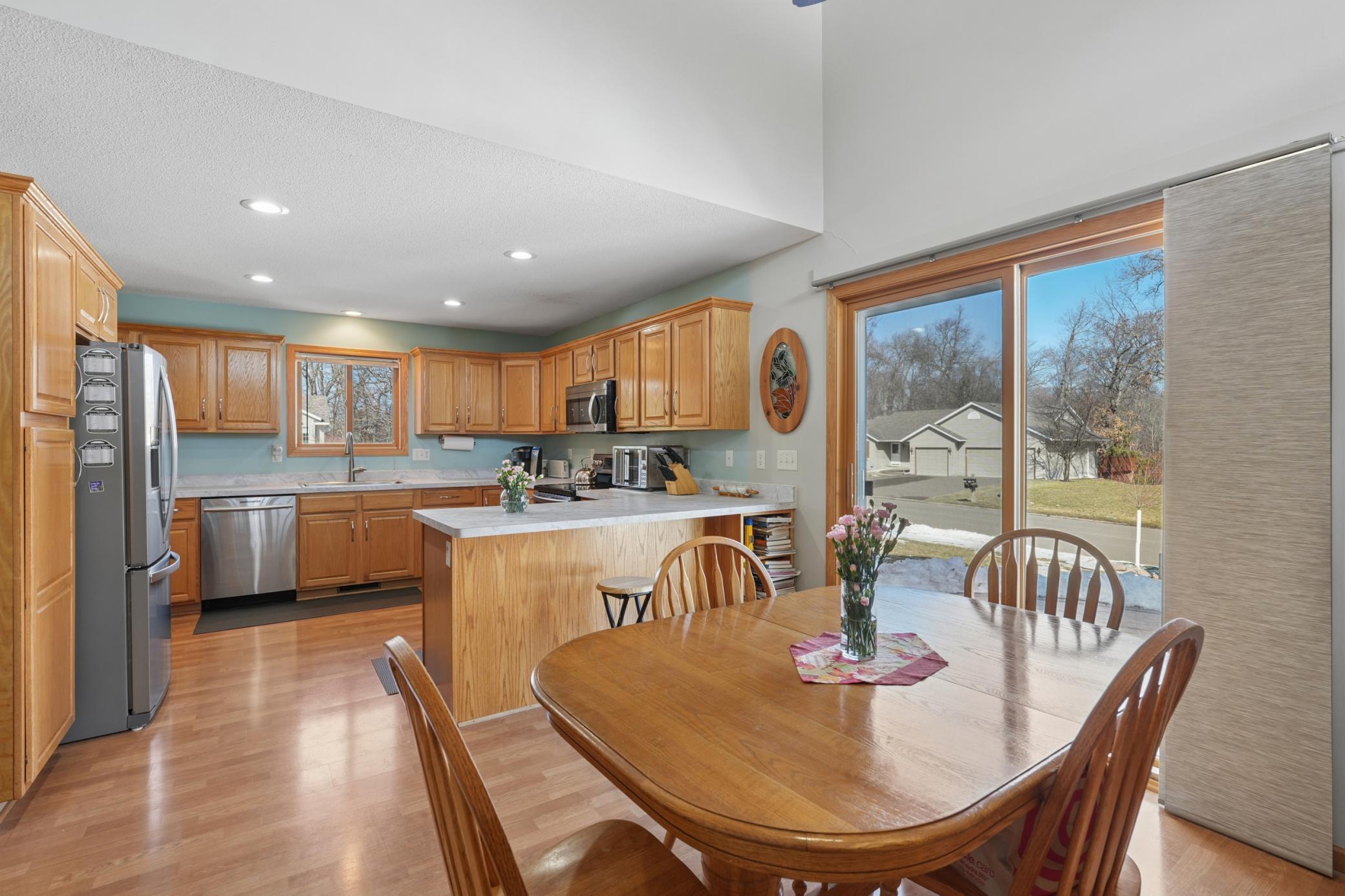Dining room patio door leads out to stamped concrete patio.