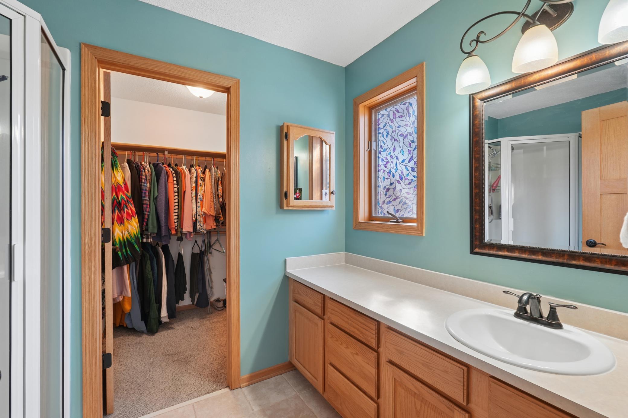Private master with shower and large walk-in closet