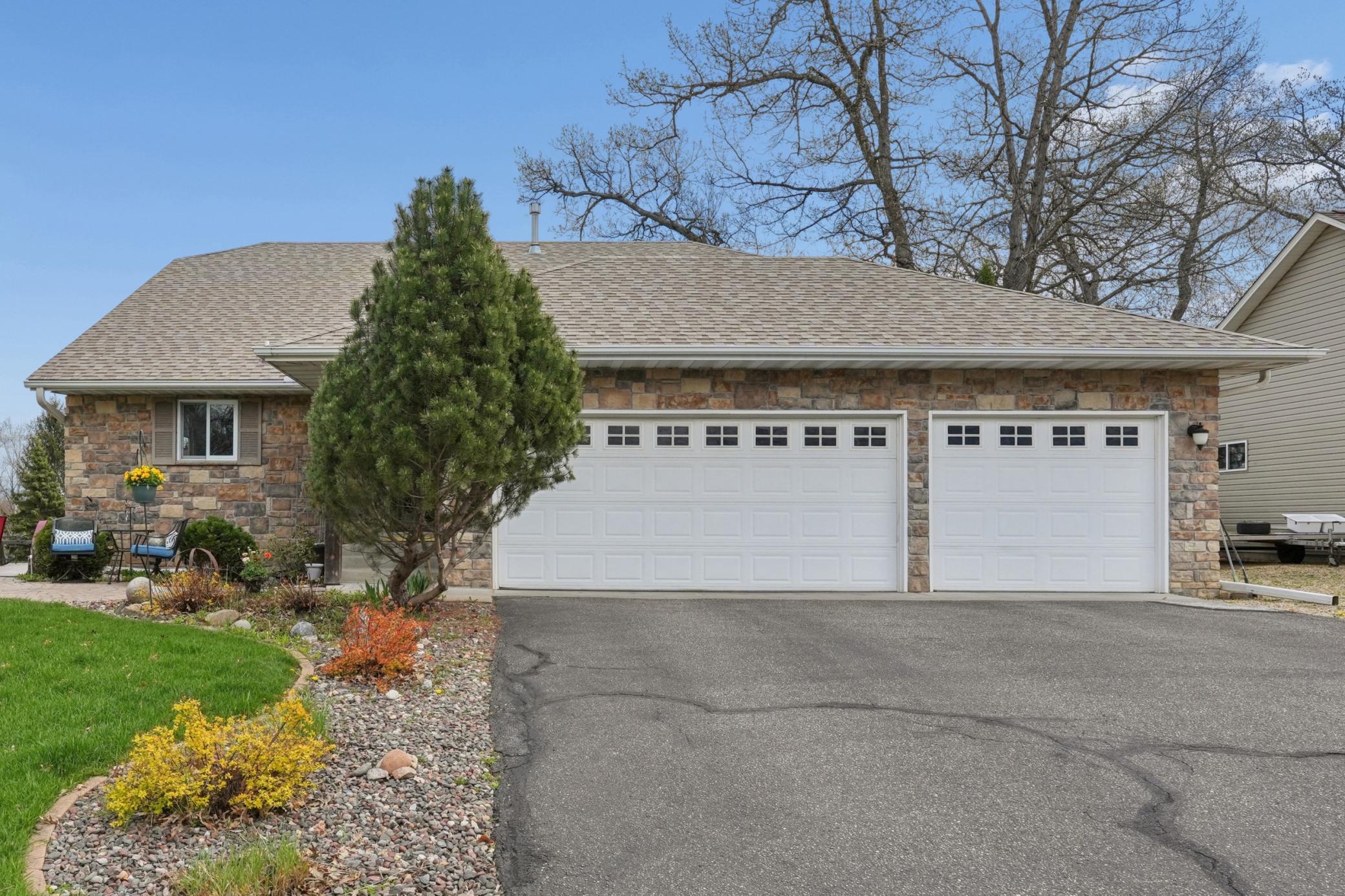 You will love your 3-stall garage with asphalt drive.