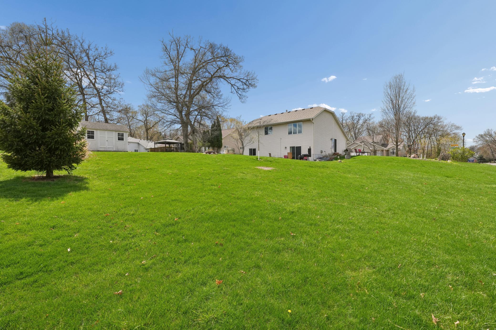 So much space for fun in the yard, more gardens. Or just enjoy the green space on your corner lot.
