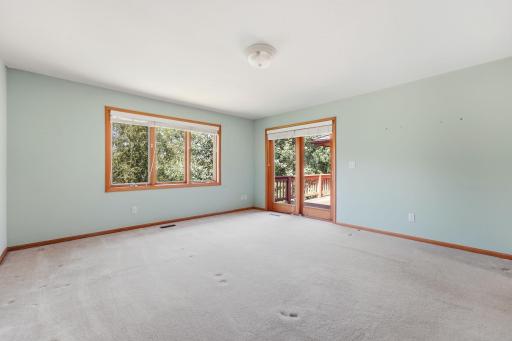 Primary Bedroom with walk out to the deck