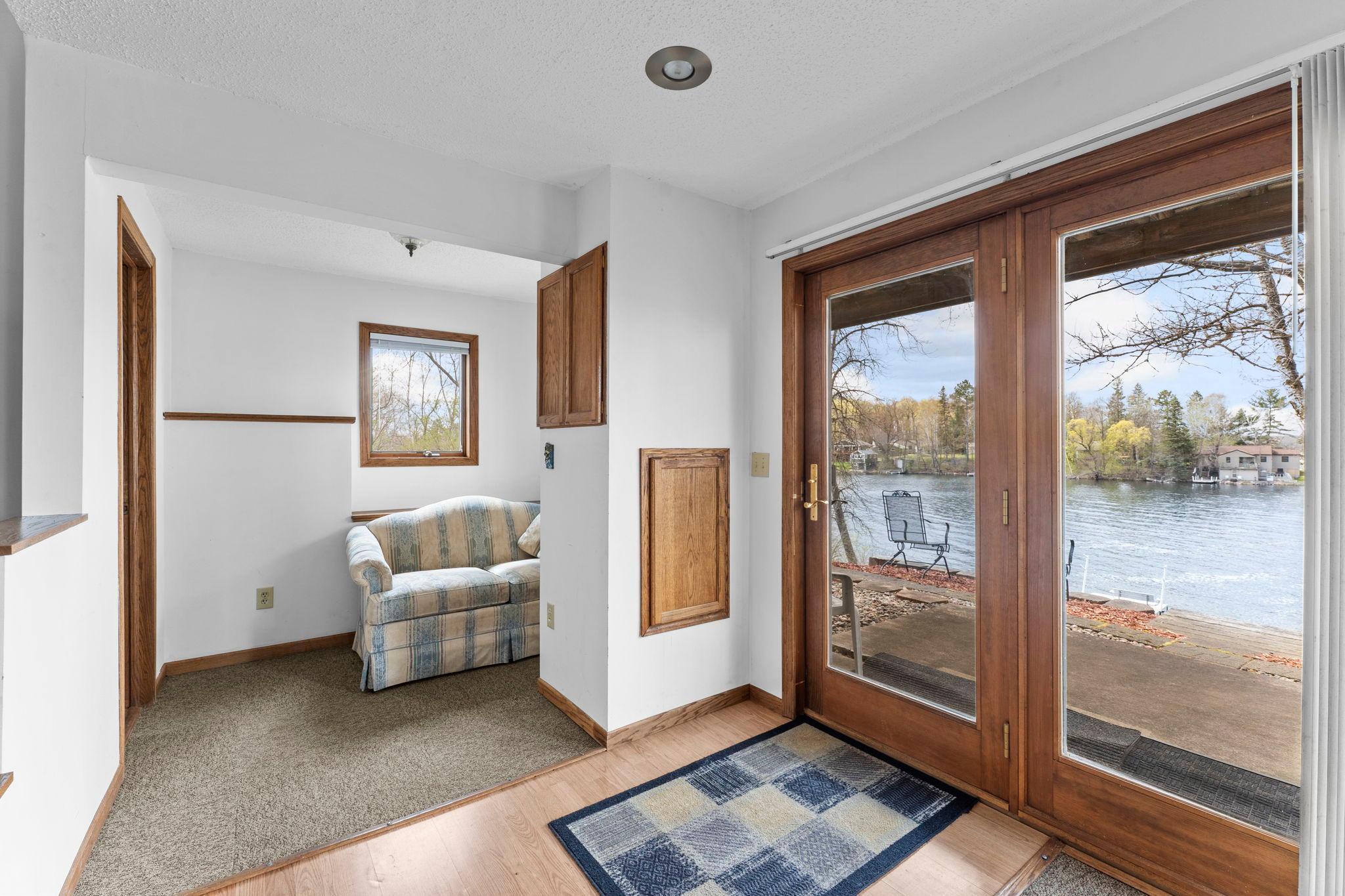 Walkout to the patio from here. Reading nook where couch is.