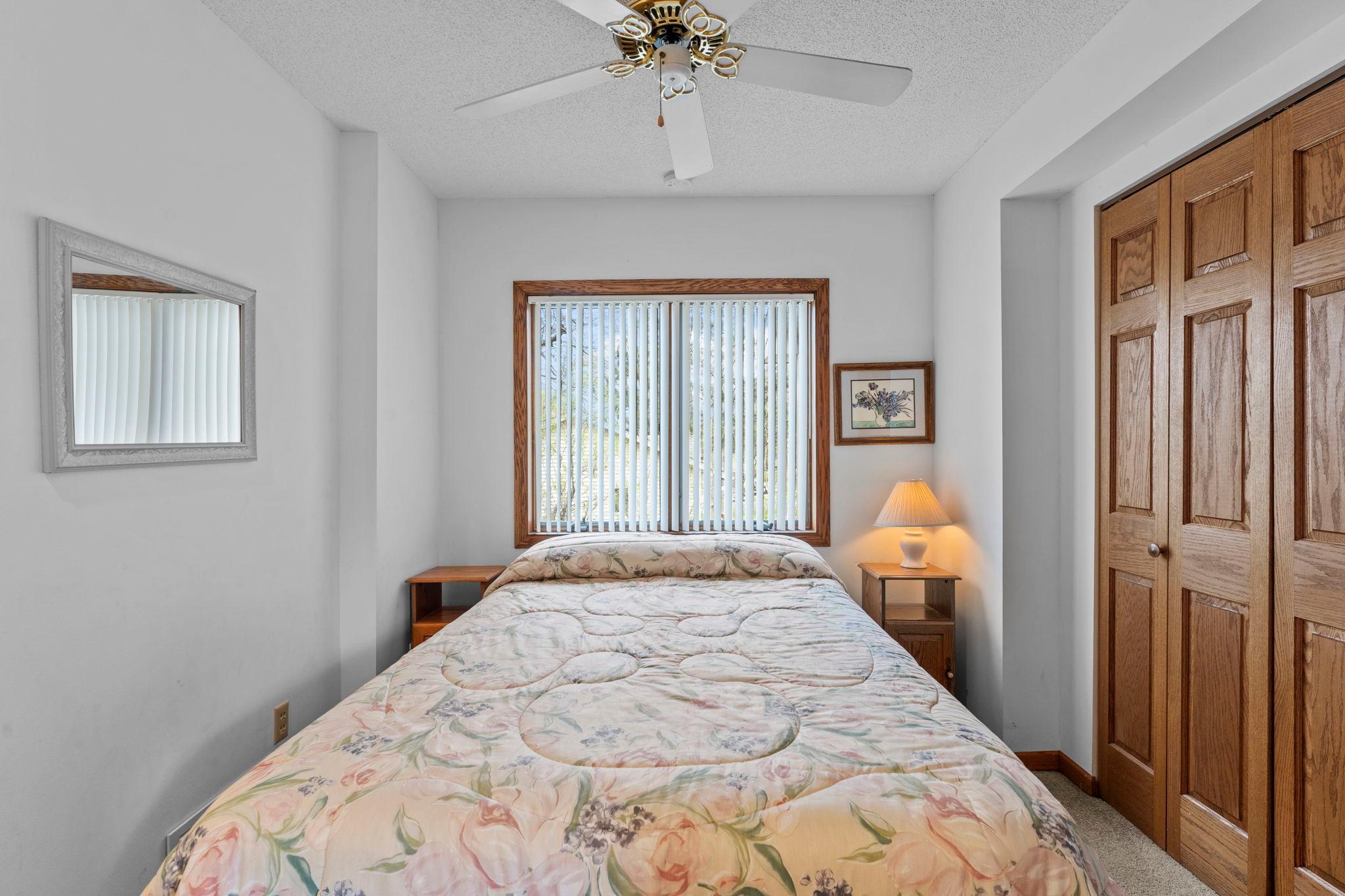Main floor bedroom with wide closet
