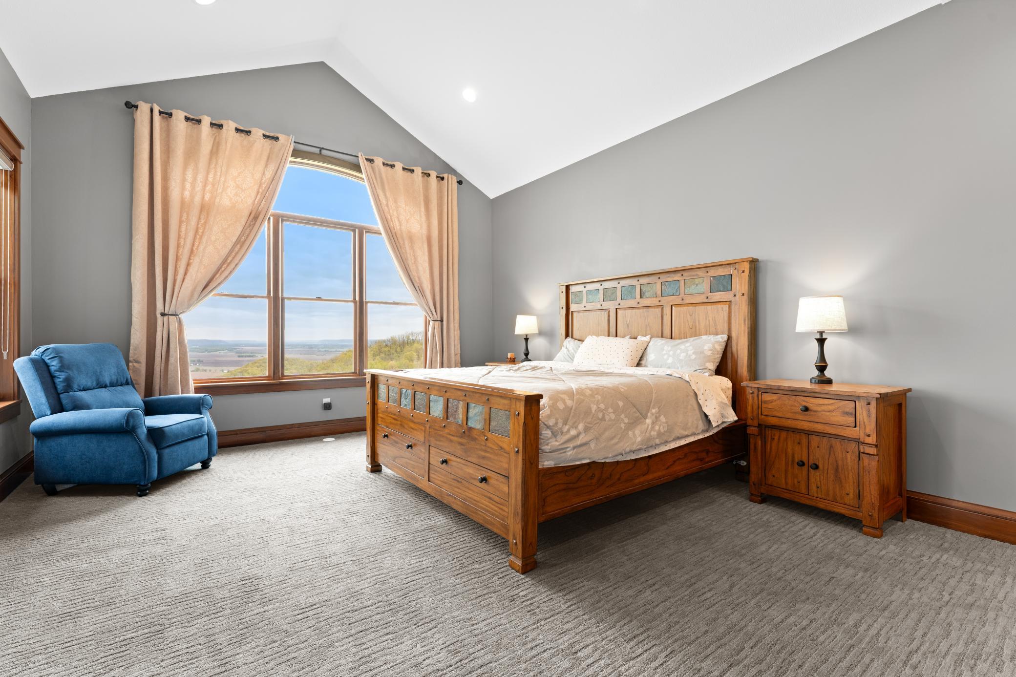 Main level primary suite with vaulted ceilings