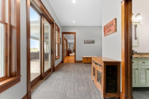 Mudroom with patio access, 3/4 bathroom and built ins