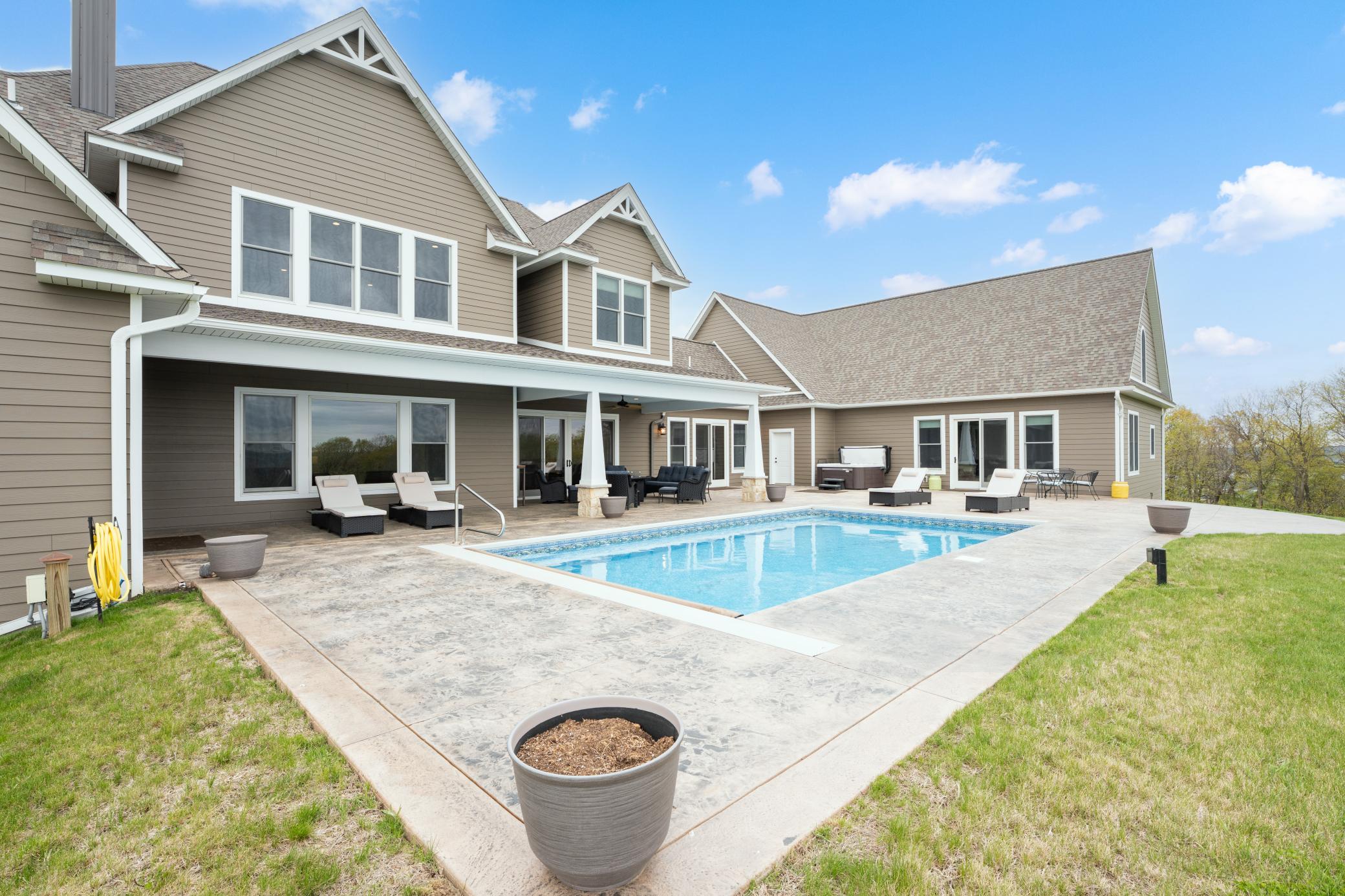 Heating, in ground saline pool with bench facing the view