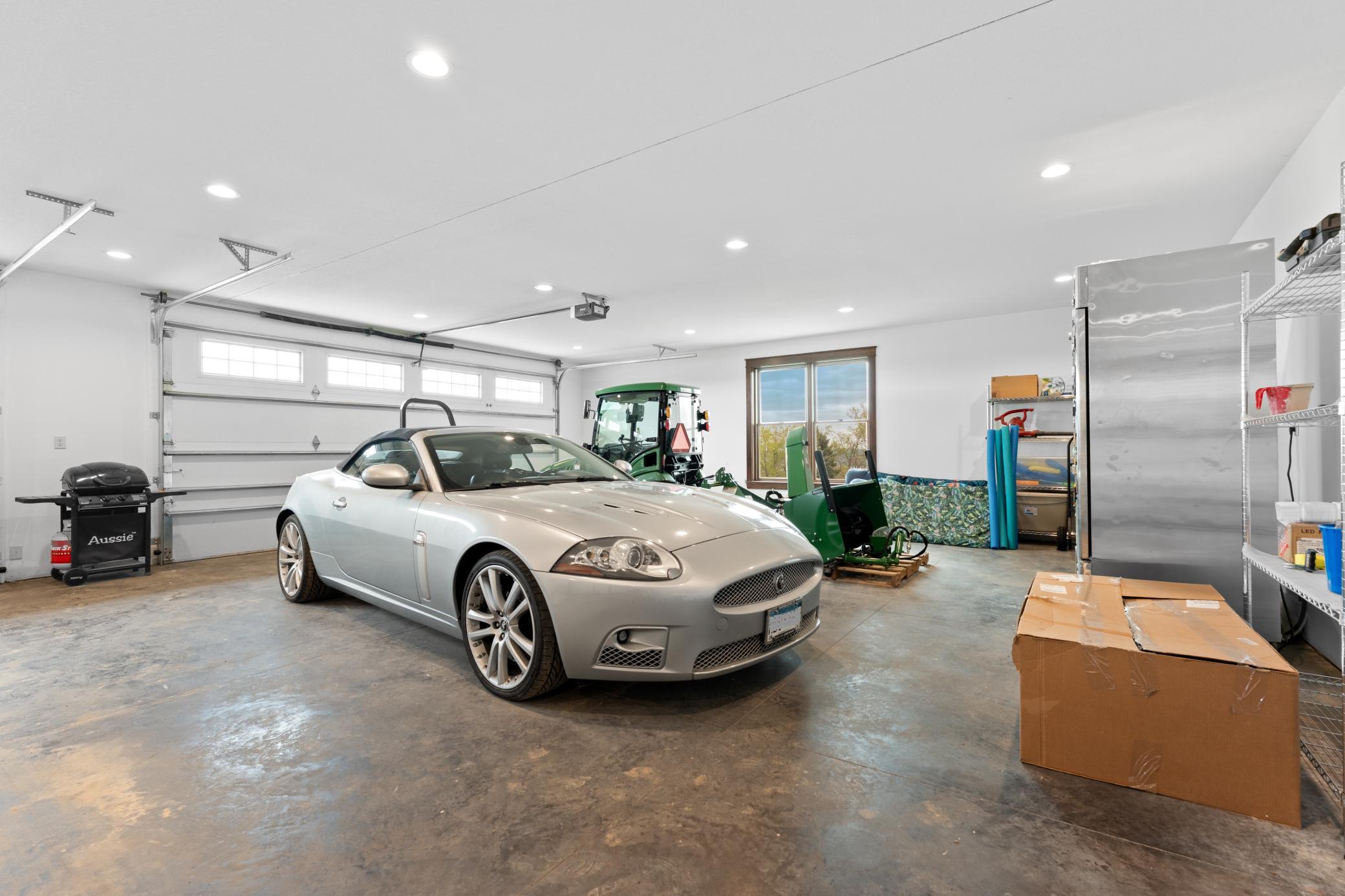 Finished 3 car heated garage with floor drains