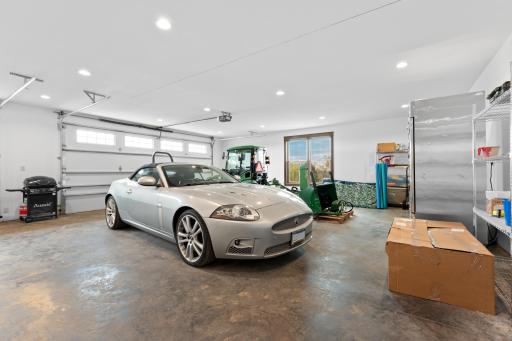 Finished 3 car heated garage with floor drains