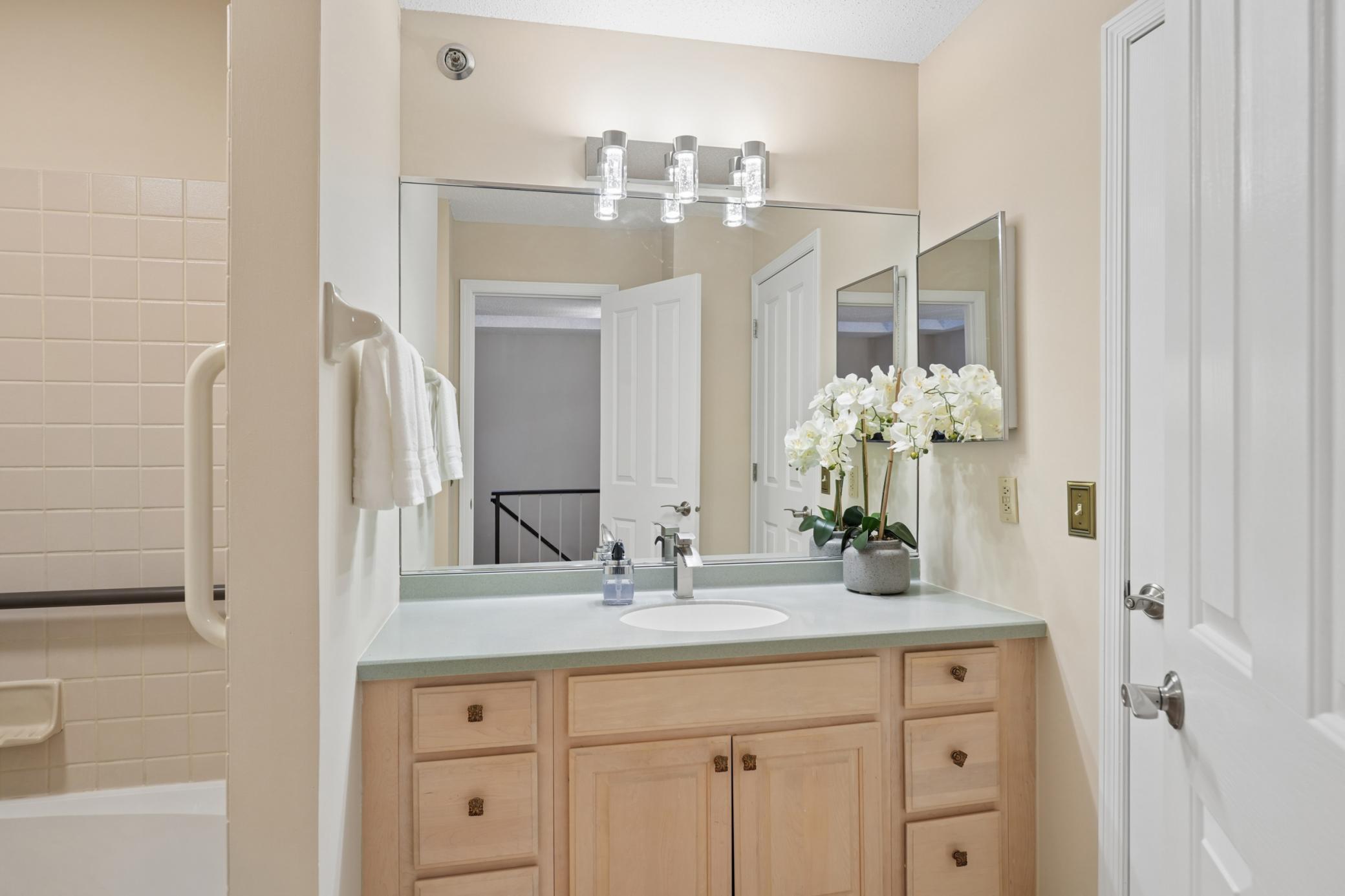 1 of 2 upper level vanity and sinks