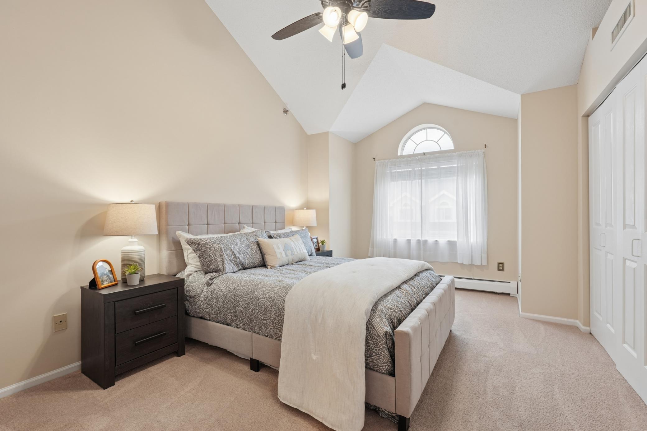 Large primary bedroom-vaulted ceilings