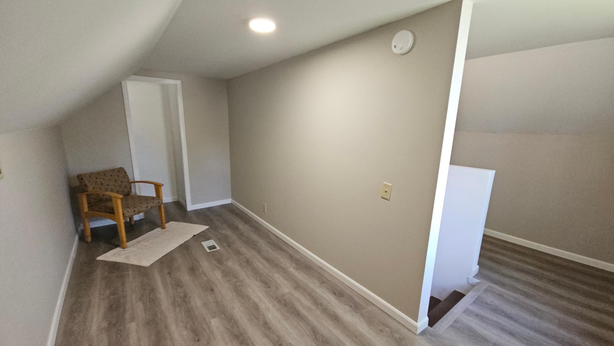 Upstairs bonus room with closet