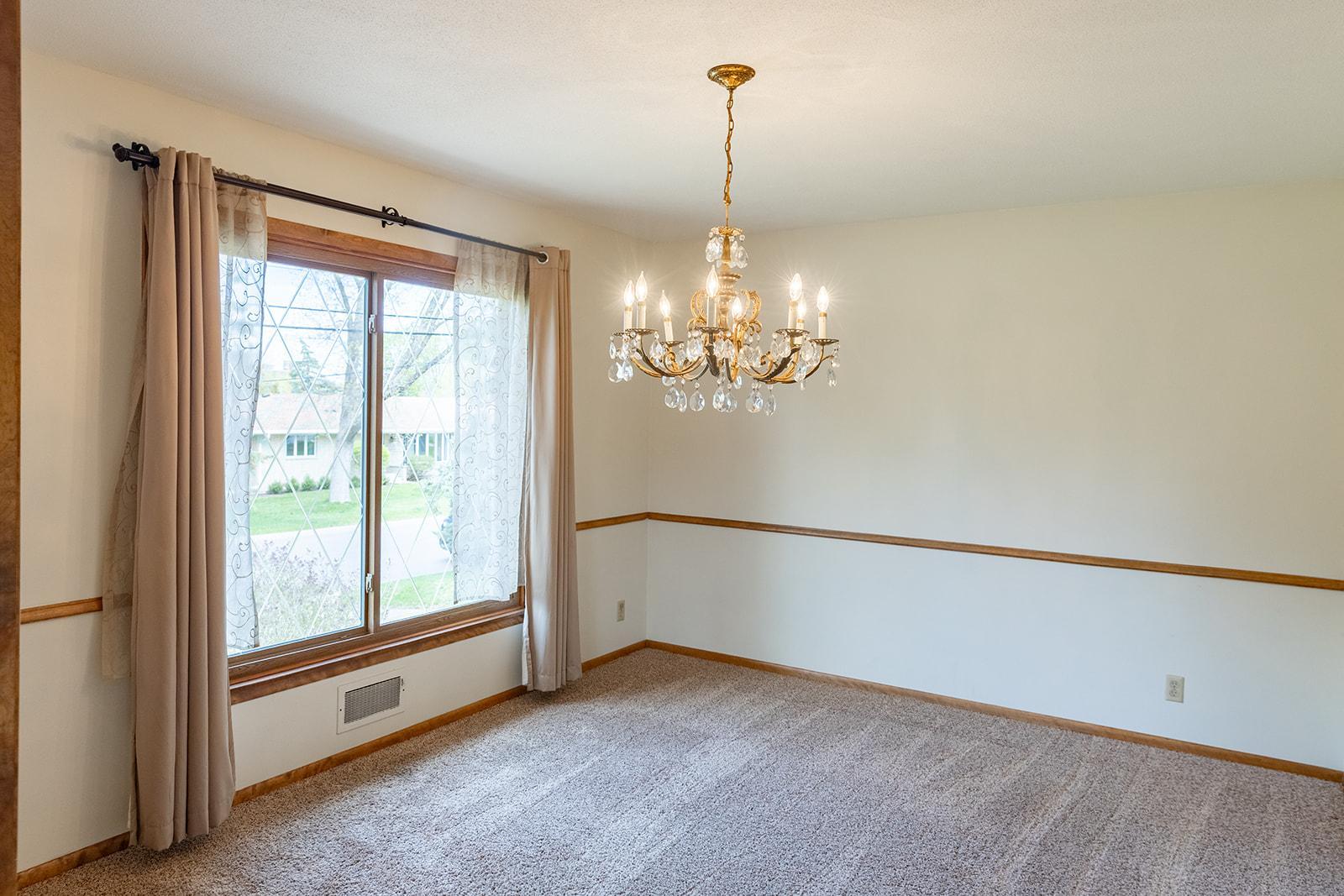 Formal Dining Room between Living Room & Kitchen