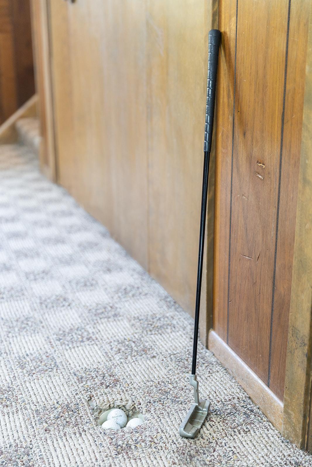 Golf putting practice hole in Amusement Room