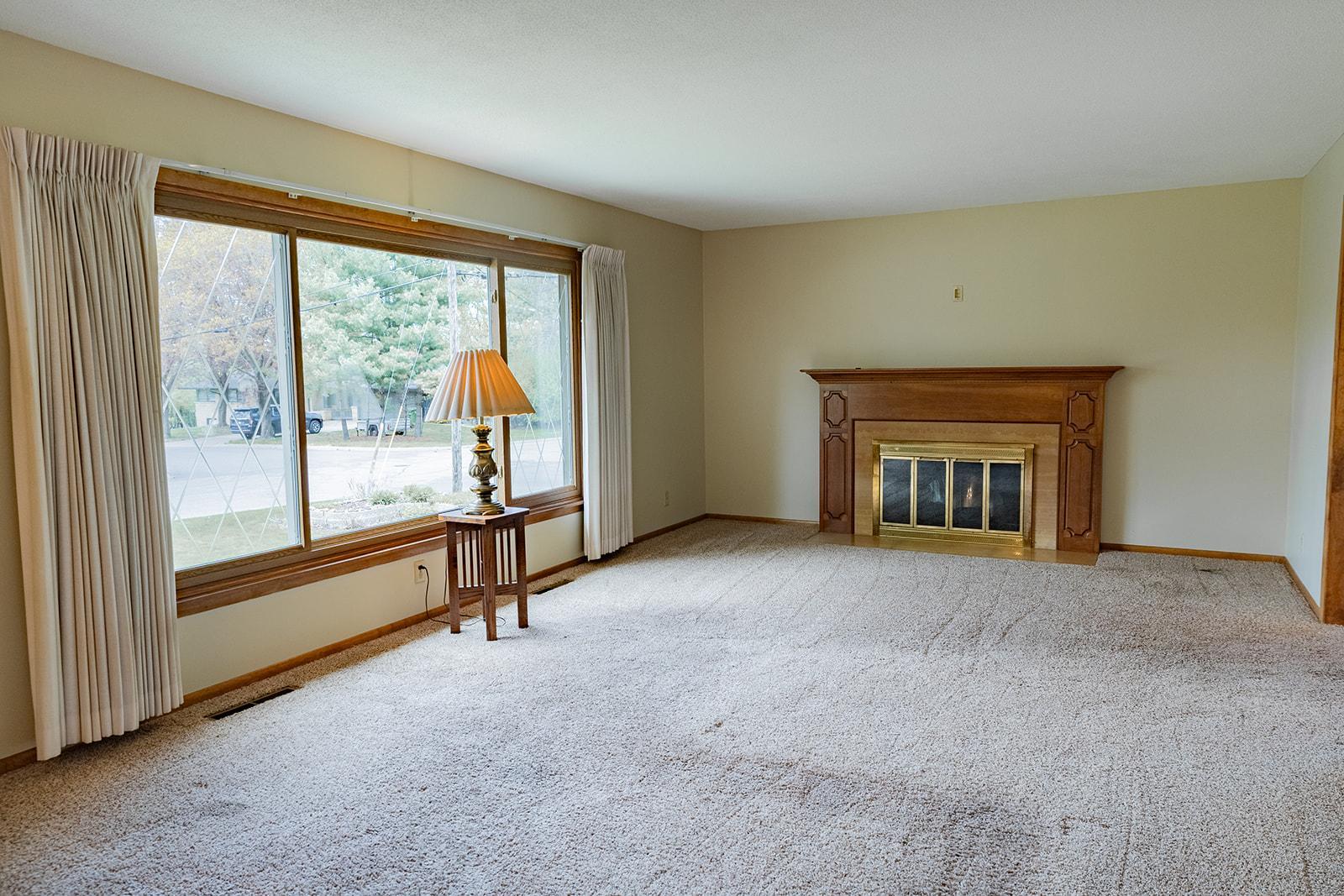 Upper-level Living Room with electric fireplace insert