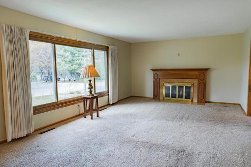Upper-level Living Room with electric fireplace insert