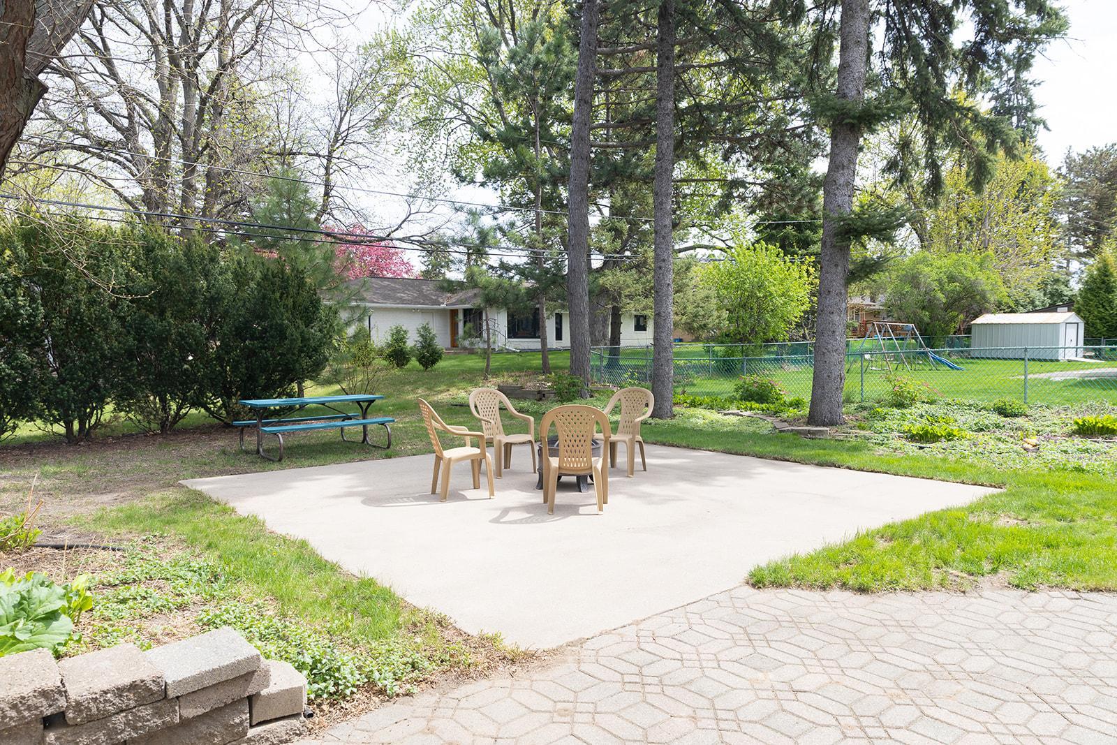 Spacious concrete Patio in Backyard